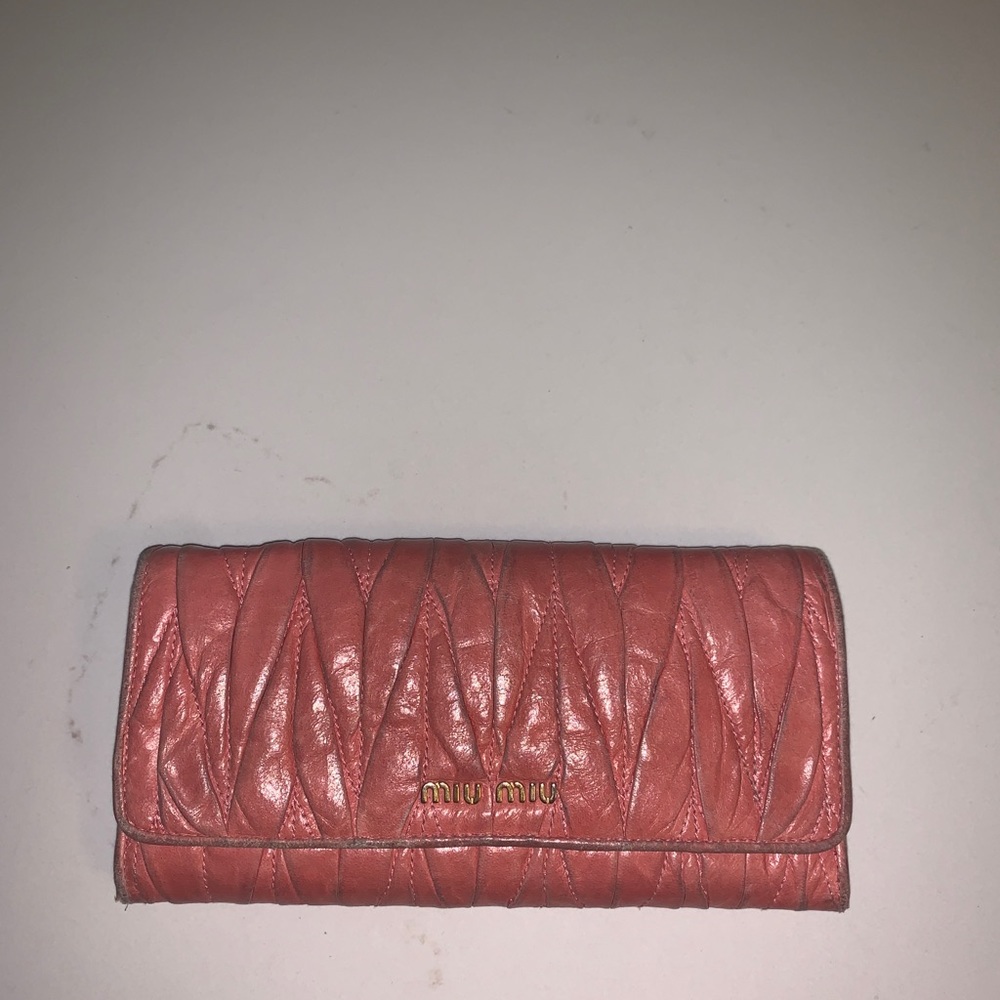 Mui Mui Matelasse long flap wallet in light pink